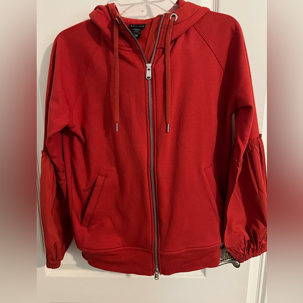 Athleta women’s dark orange zip-Up hoodie.